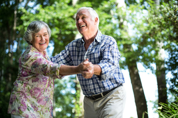 Elderly couple volunteering