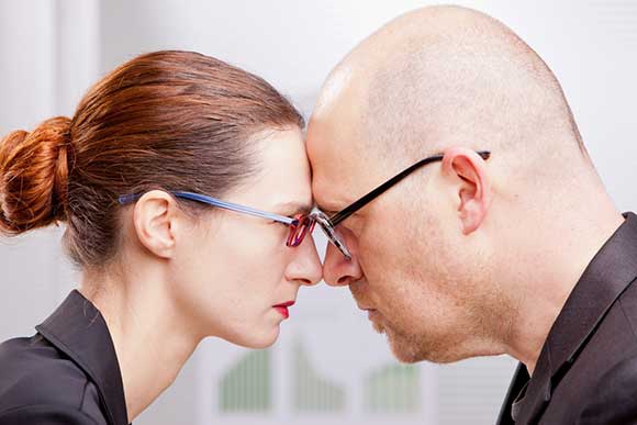 Man and woman locking heads