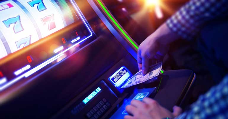 Putting money in pokies