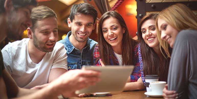 Group looking at a tablet