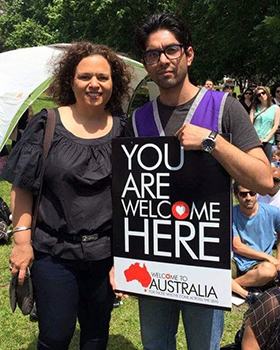 Romal Baluchzada welcoming refugees