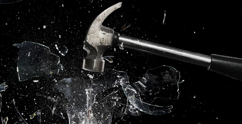 Hammer smashing glass