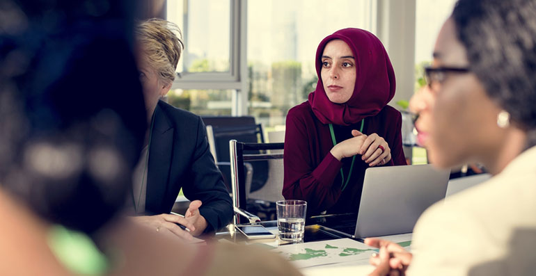 Woman wearing headscarf in workplace