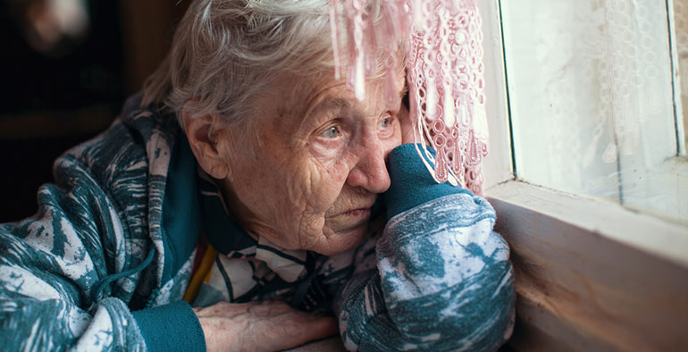 Lady looking out her window