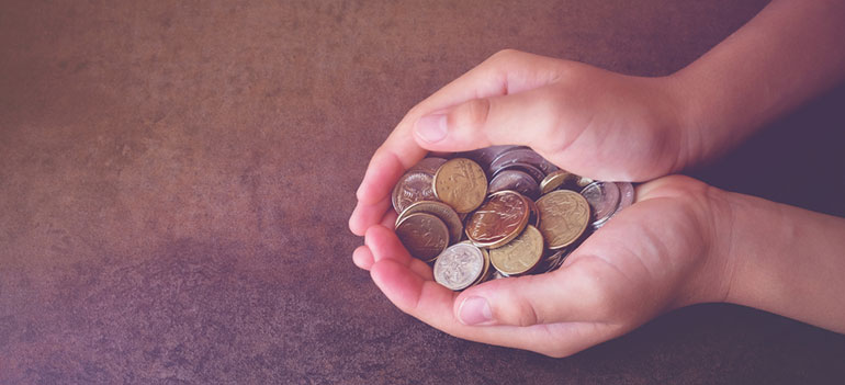 Hands holding coins