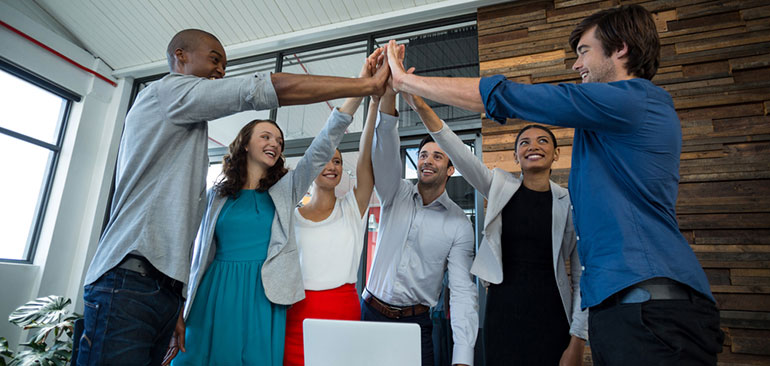 Office people high fiving