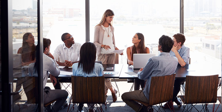 woman leading a board meeting