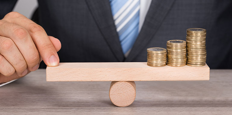 Balancing a see saw with coins on the end