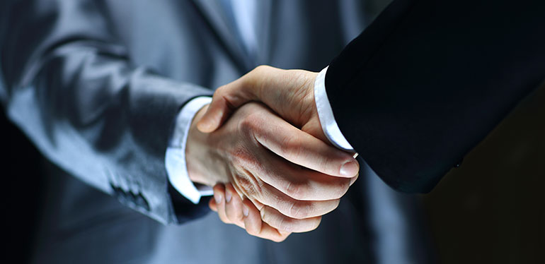 Business men shaking hands