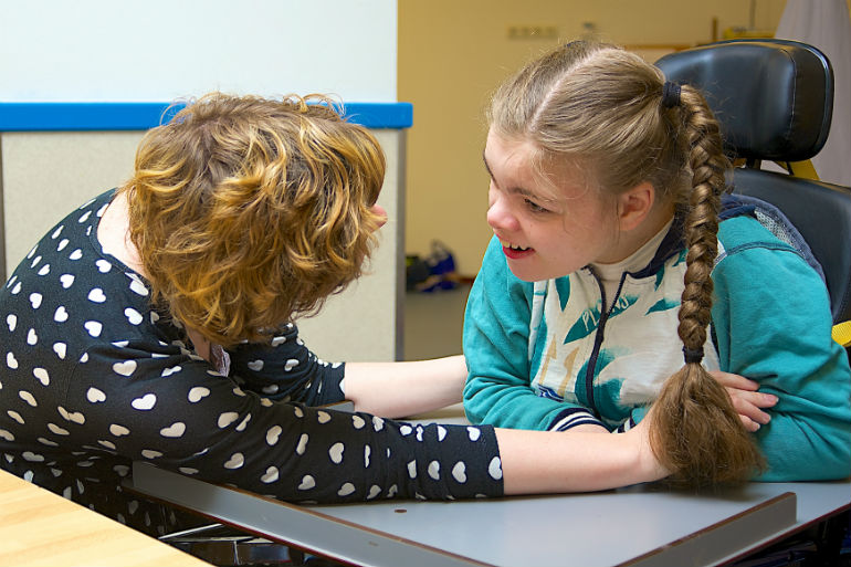 girl with a disability cared for