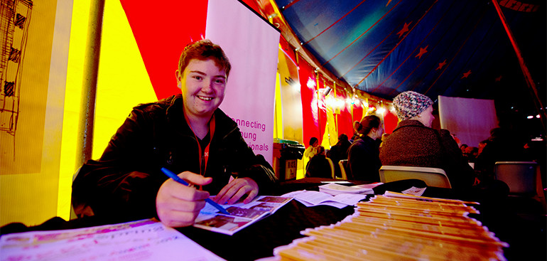 Young volunteer at festival