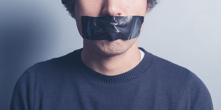 Man with tape covering his mouth