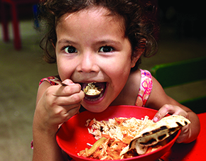 Girl eating Zambrero meal