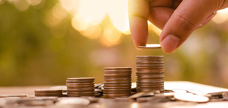 person counting coins