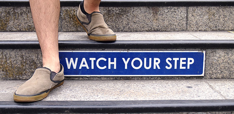 watch your step sign