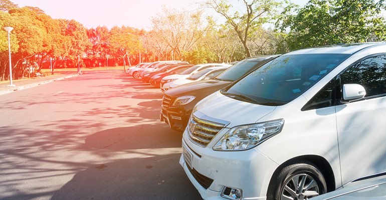 Cars parked in sun