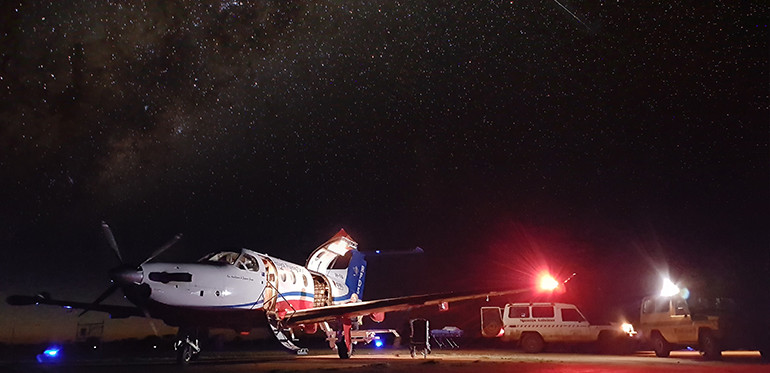 plane on the ground at night