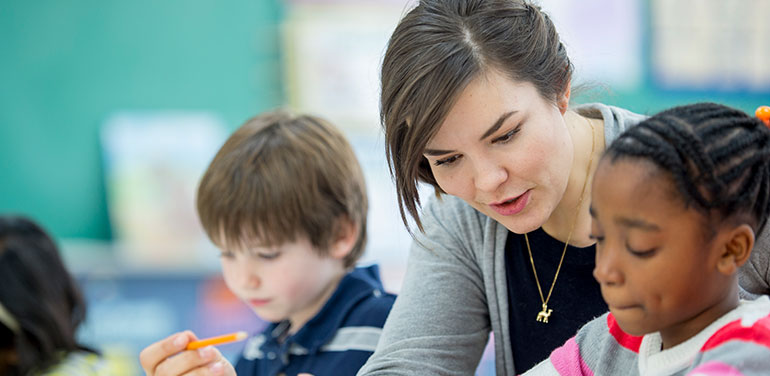 Teacher with students