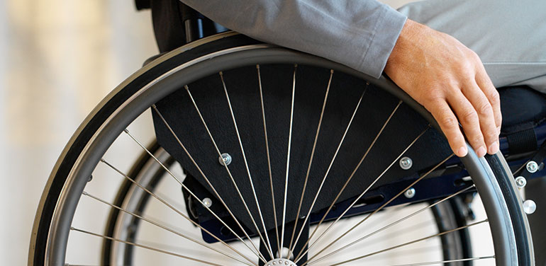 Close up of person in wheelchair