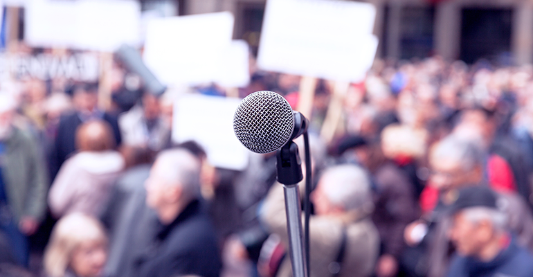 microphone in front of protest