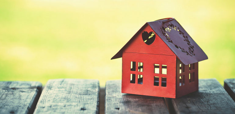 red model house on a table