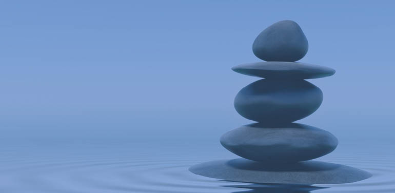 stack of pebbles in water, cover image of Salary Survey