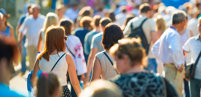 people walking on busy street