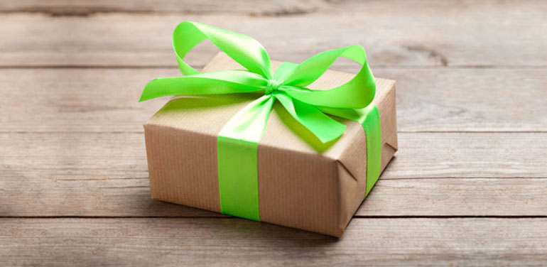 gift tied up with a green ribbon