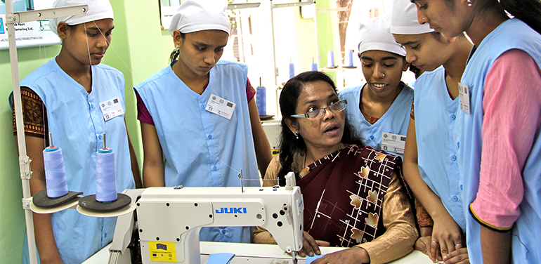 Women with sowing machine