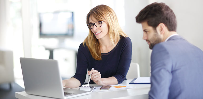 man and women making financial decisions