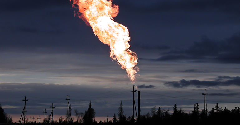 fire coming out of fossil fuel station