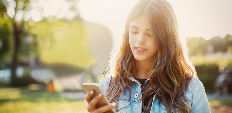 Young Woman Looking at Phone