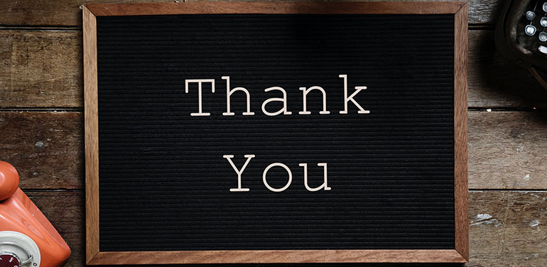 Thank you written on a blackboard