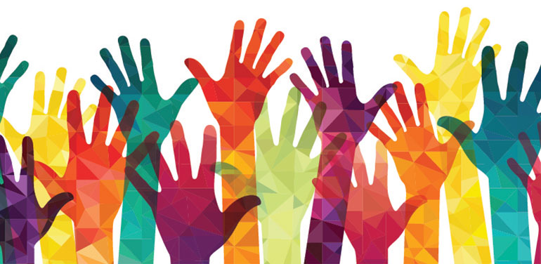 Image of colourful hands in the air