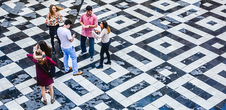 Aerial view of group of people in a square