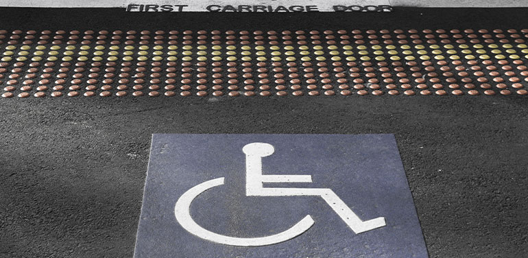 wheelchair sign on tram stop