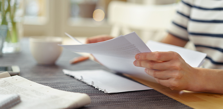 person holding paper