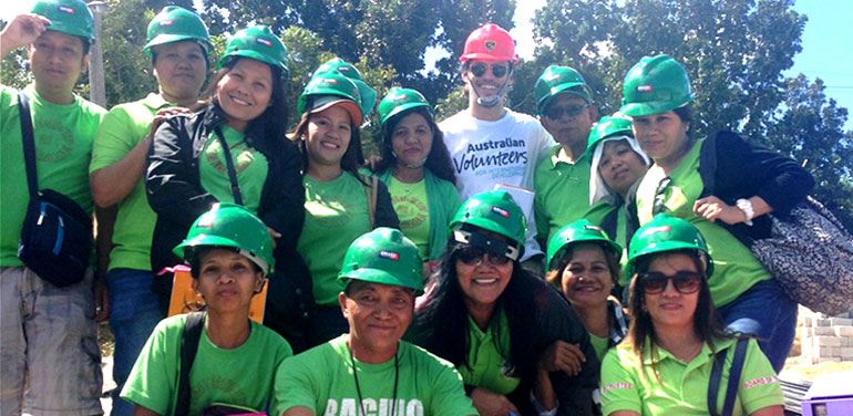 Lachlan James with his team in the Philippines