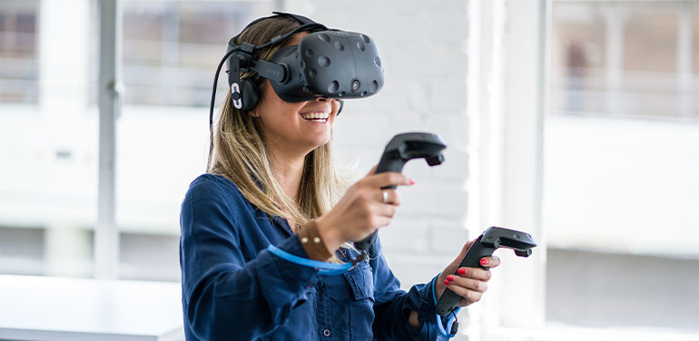 Young woman wearing a virtual reality headset.