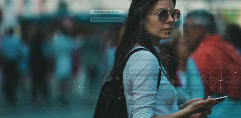 Woman in crowded place, her face is being digitally scanned