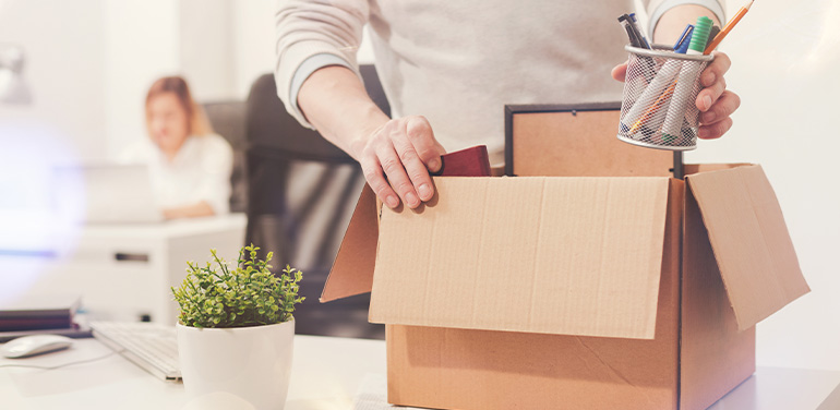 Man packing up desk