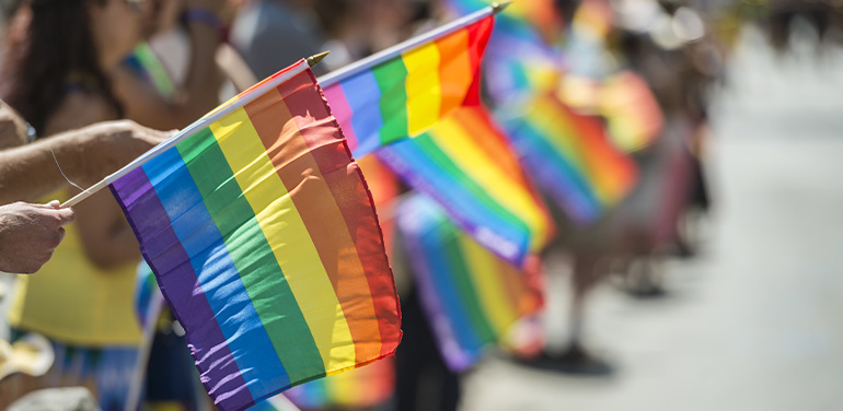 rainbow flags line the street