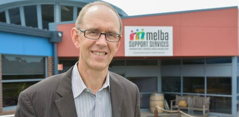 Glenn Foard standing outside the Melba office