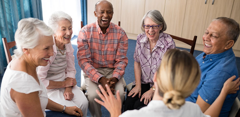 group of seniors with female doctor