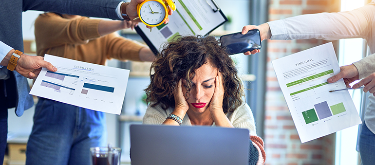 stressed person at desk