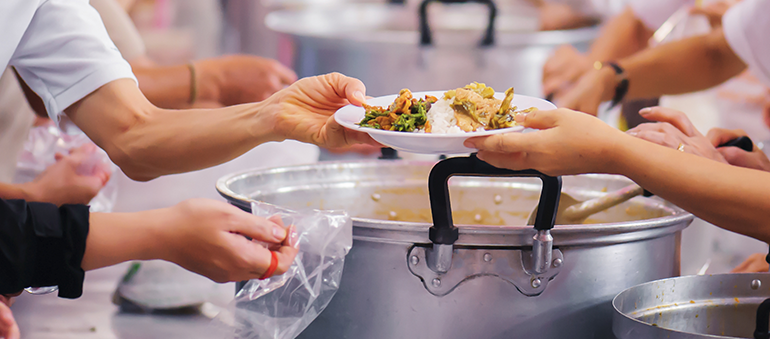 volunteers in soup kitchen