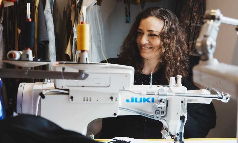 Woman at sewing machine