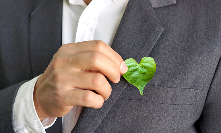 man holding leaf heart