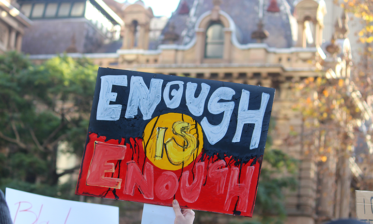 person holding sign