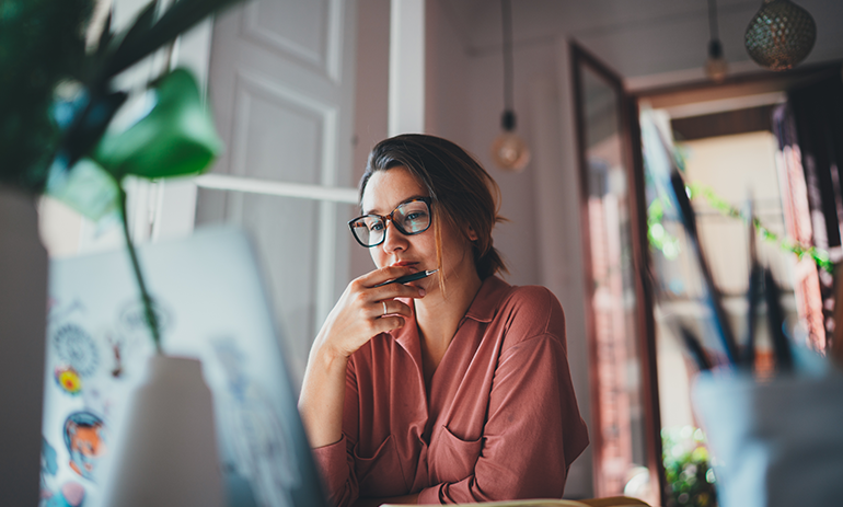 woman looking at computer